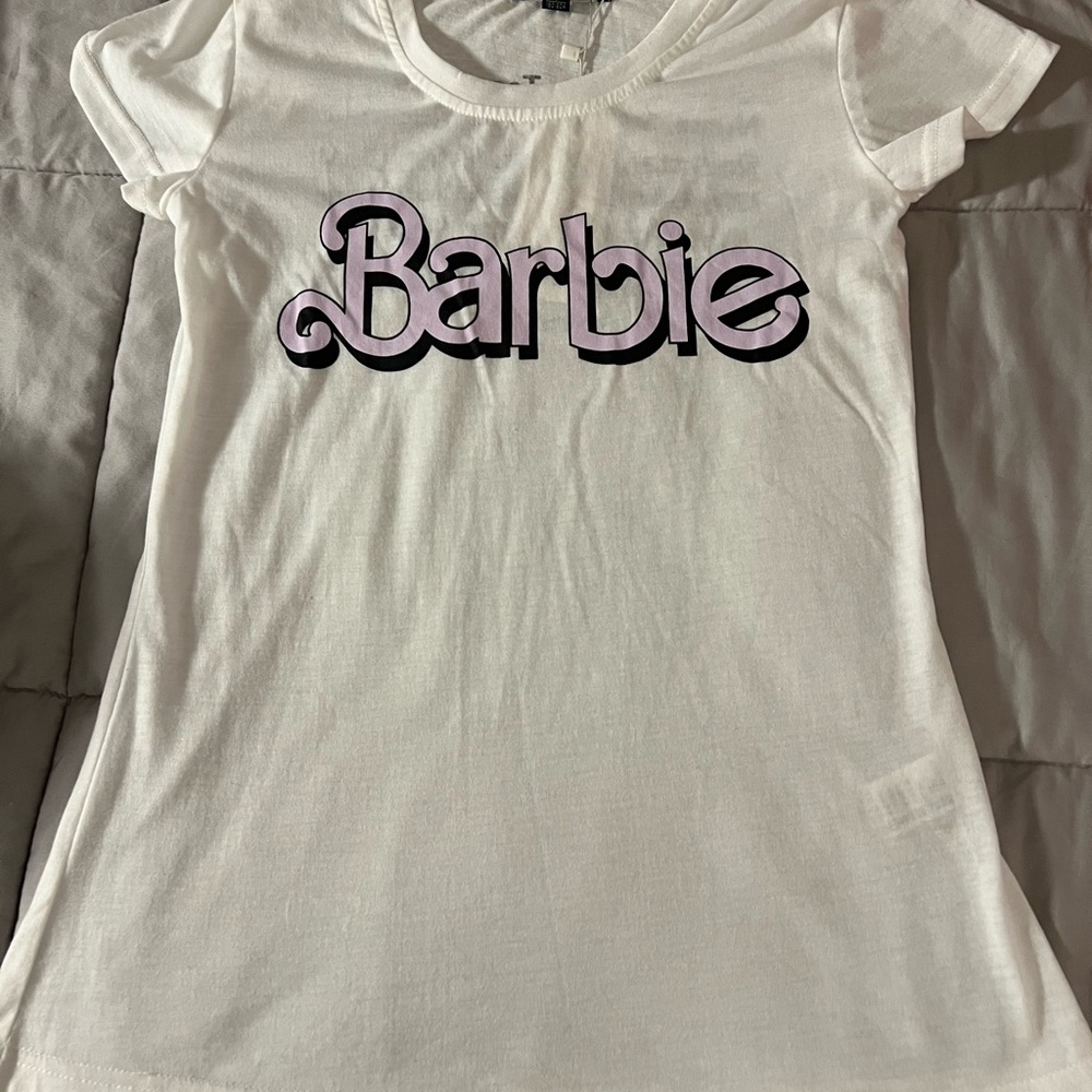 Barbie White Kids short  Shirt size  small.